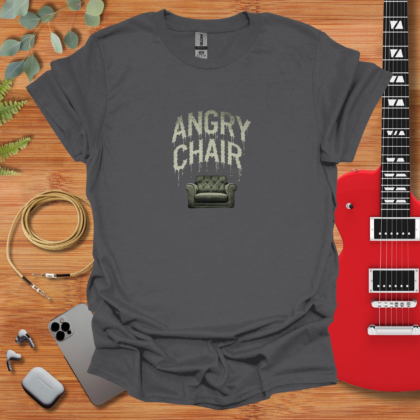 a grey t - shirt with an angry chair on it