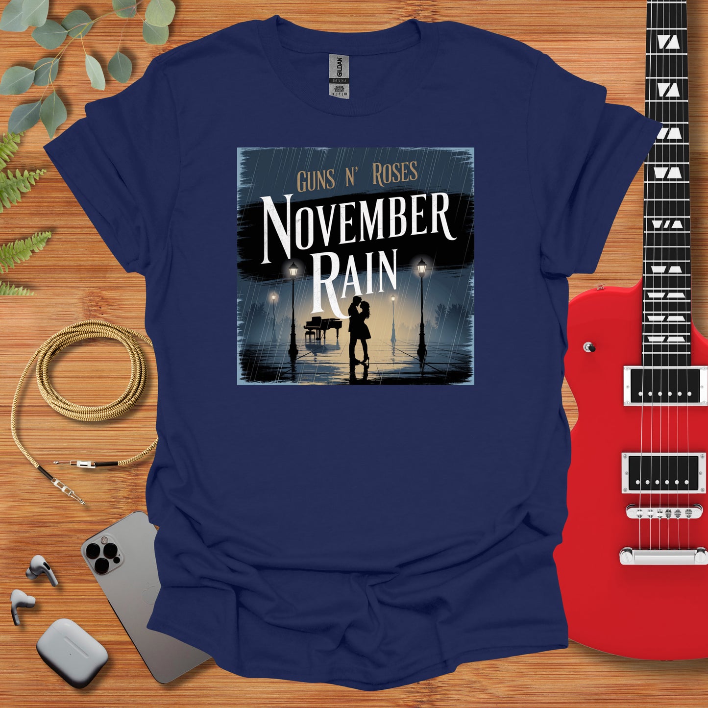 a t - shirt with a picture of a person holding a guitar