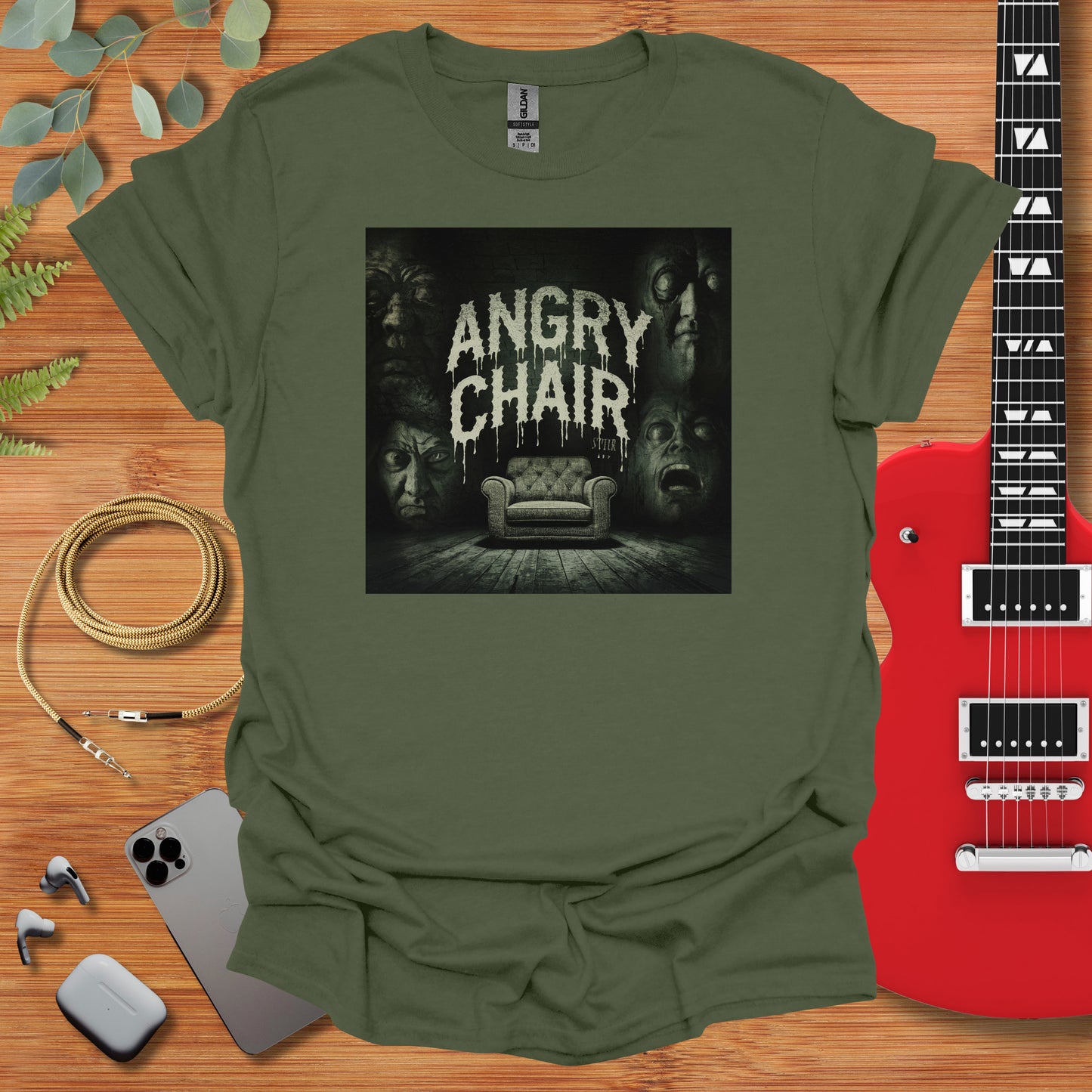 a green t - shirt with the words angry chair on it