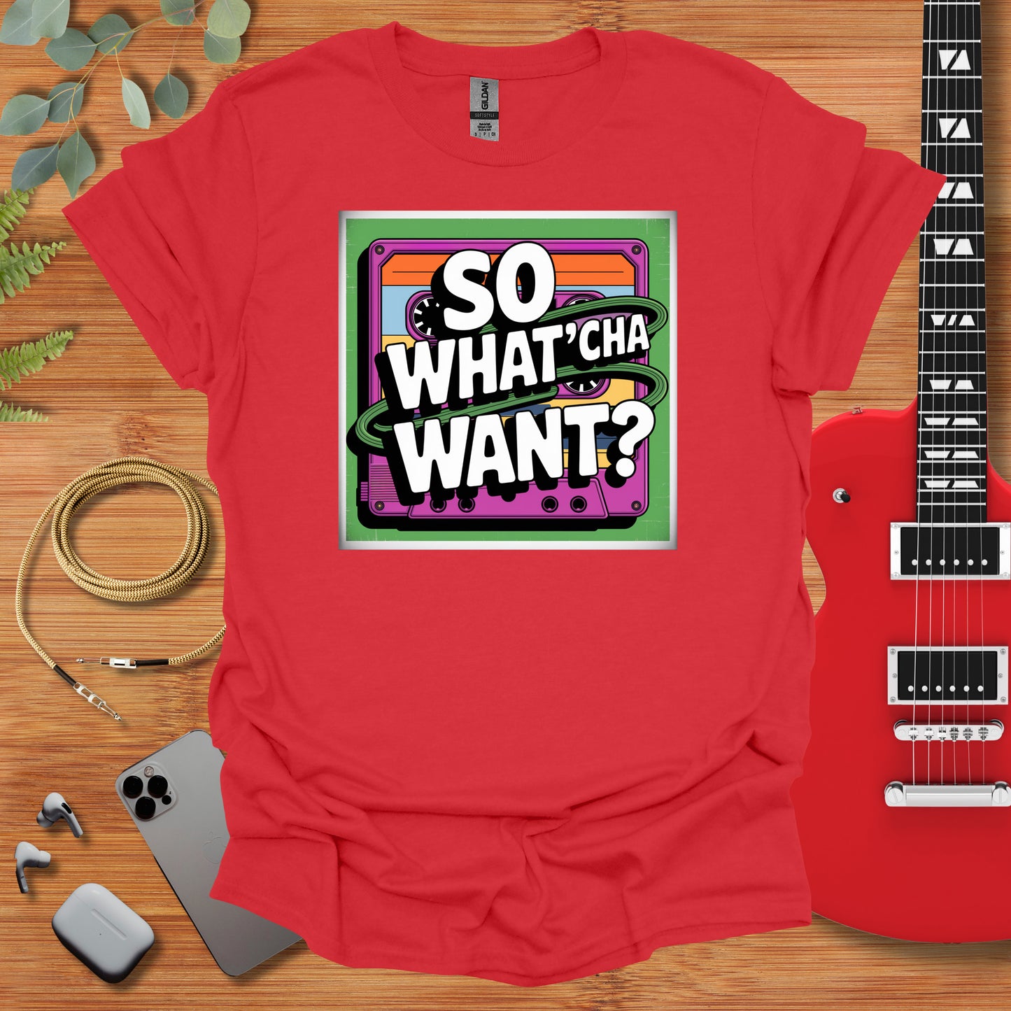 a red t - shirt with the words so whatcha want? on it