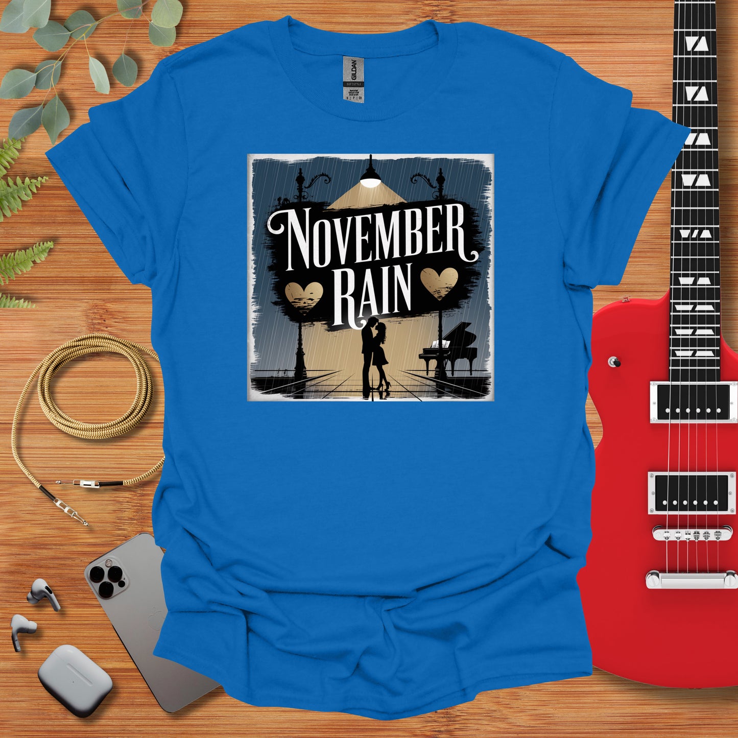 a blue t - shirt with the words november rain on it