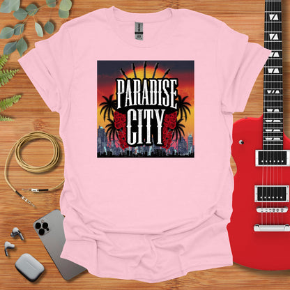 a pink shirt with the words paradise city on it