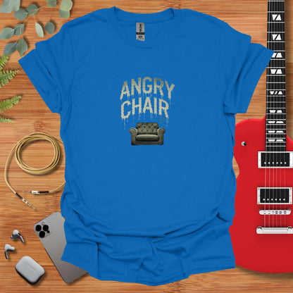 a blue t - shirt that says angry chair next to a guitar