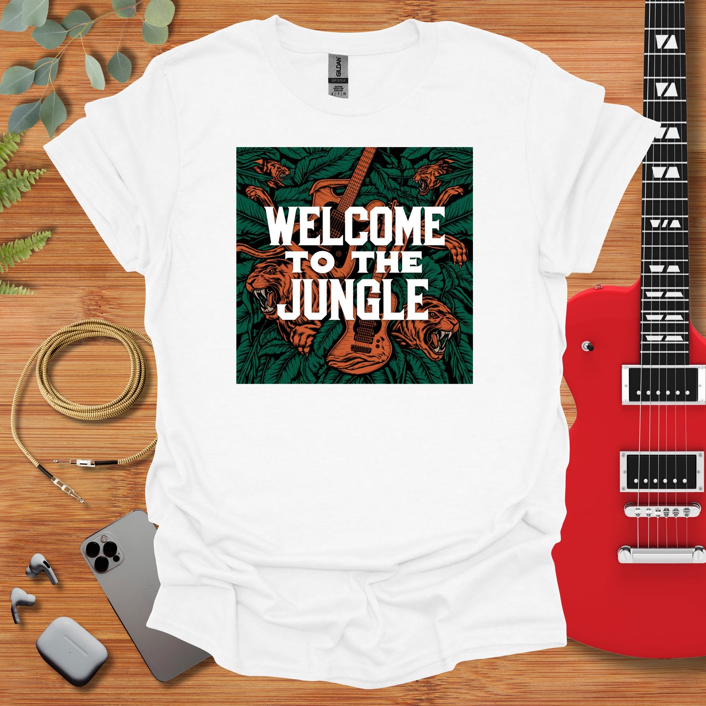 a white t - shirt with the words welcome to the jungle on it