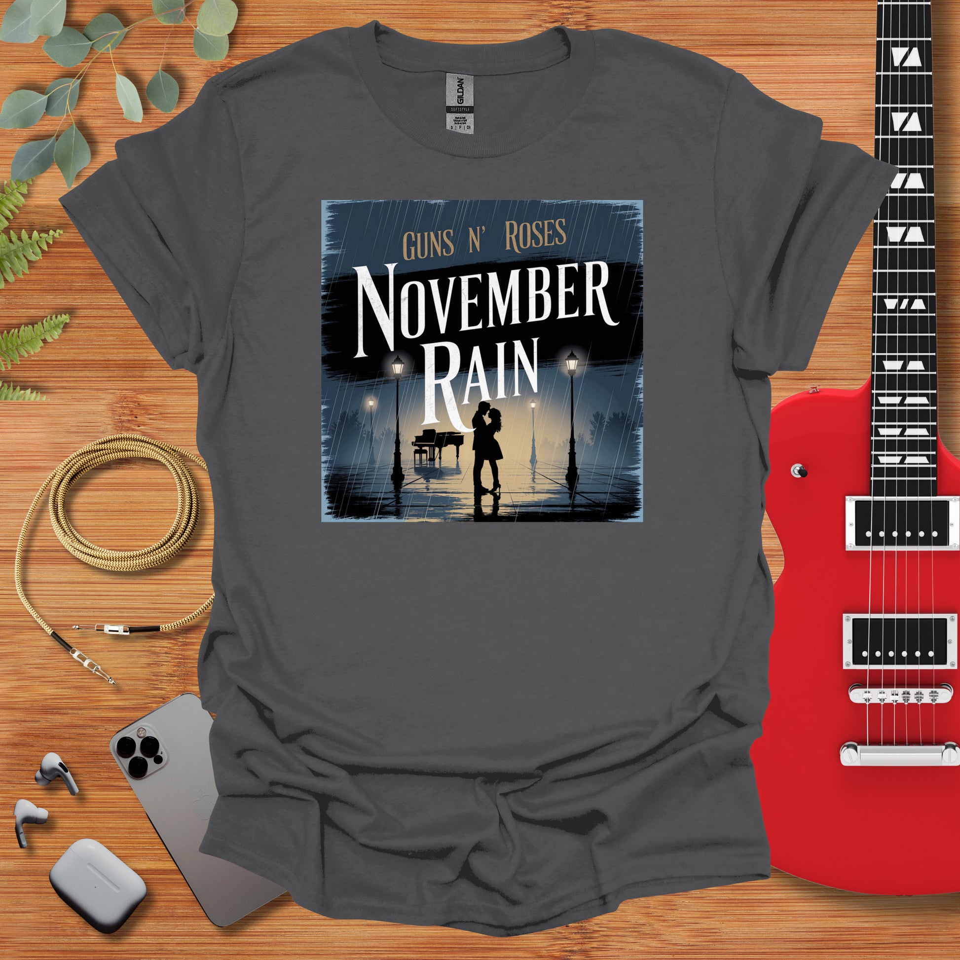 a t - shirt with a picture of a person holding a guitar