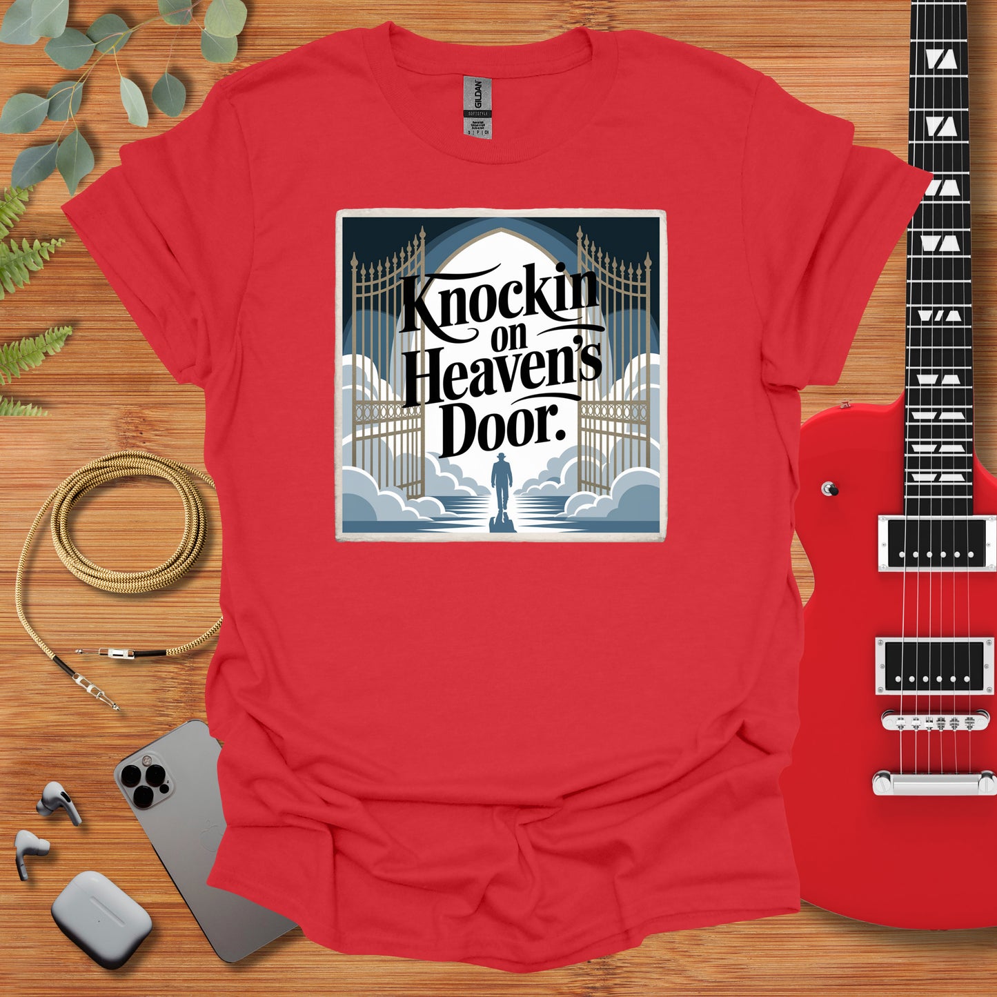 a red t - shirt with the words rock'n'heavy doors on it