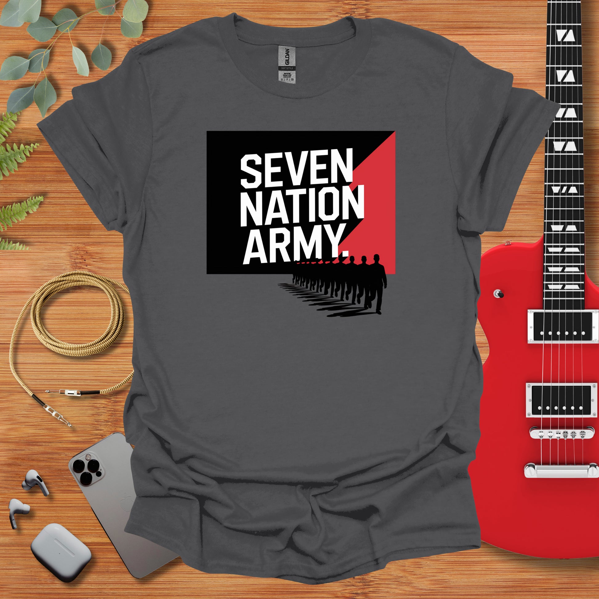 a t - shirt with the words seven nation army on it