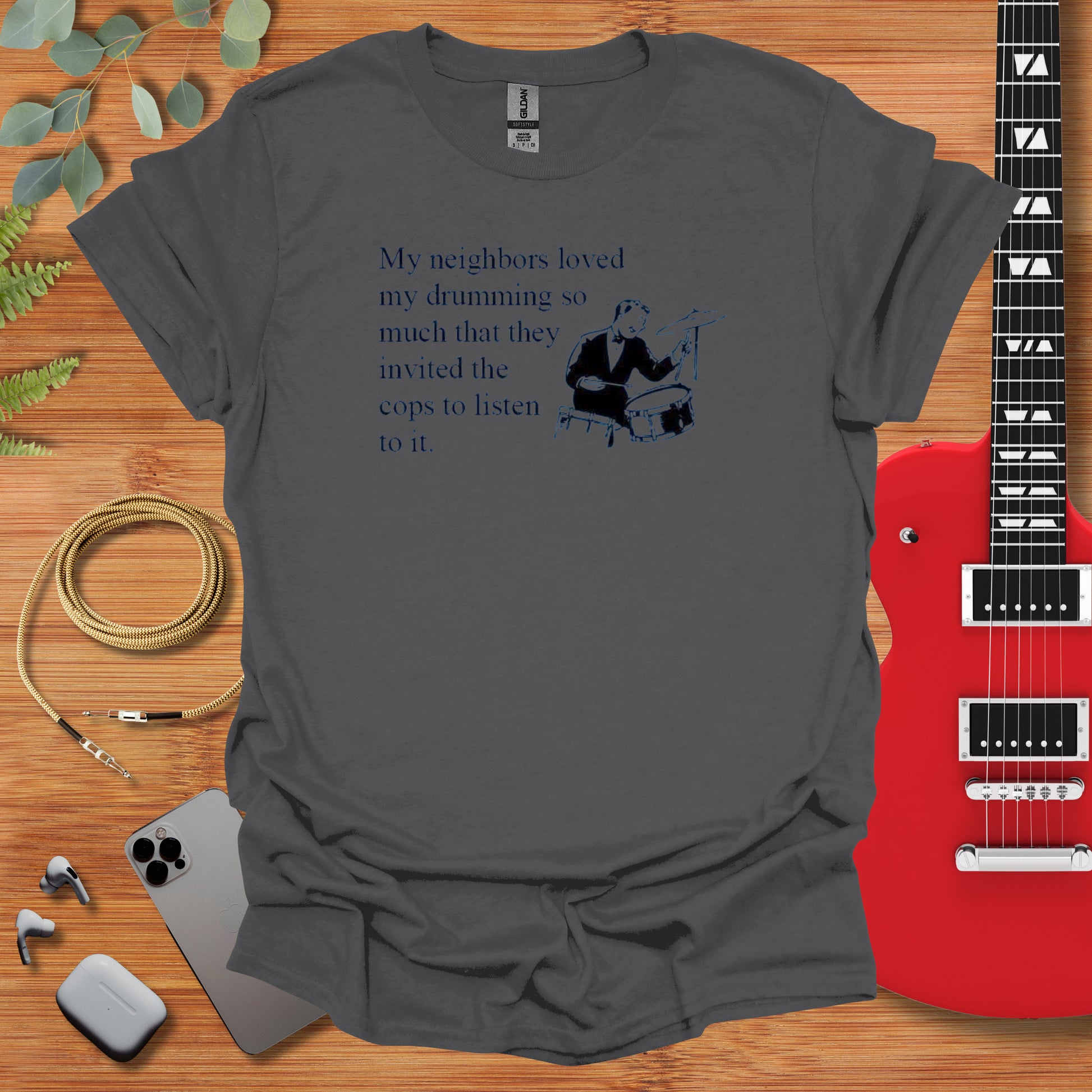 a guitar and a t - shirt with a poem on it