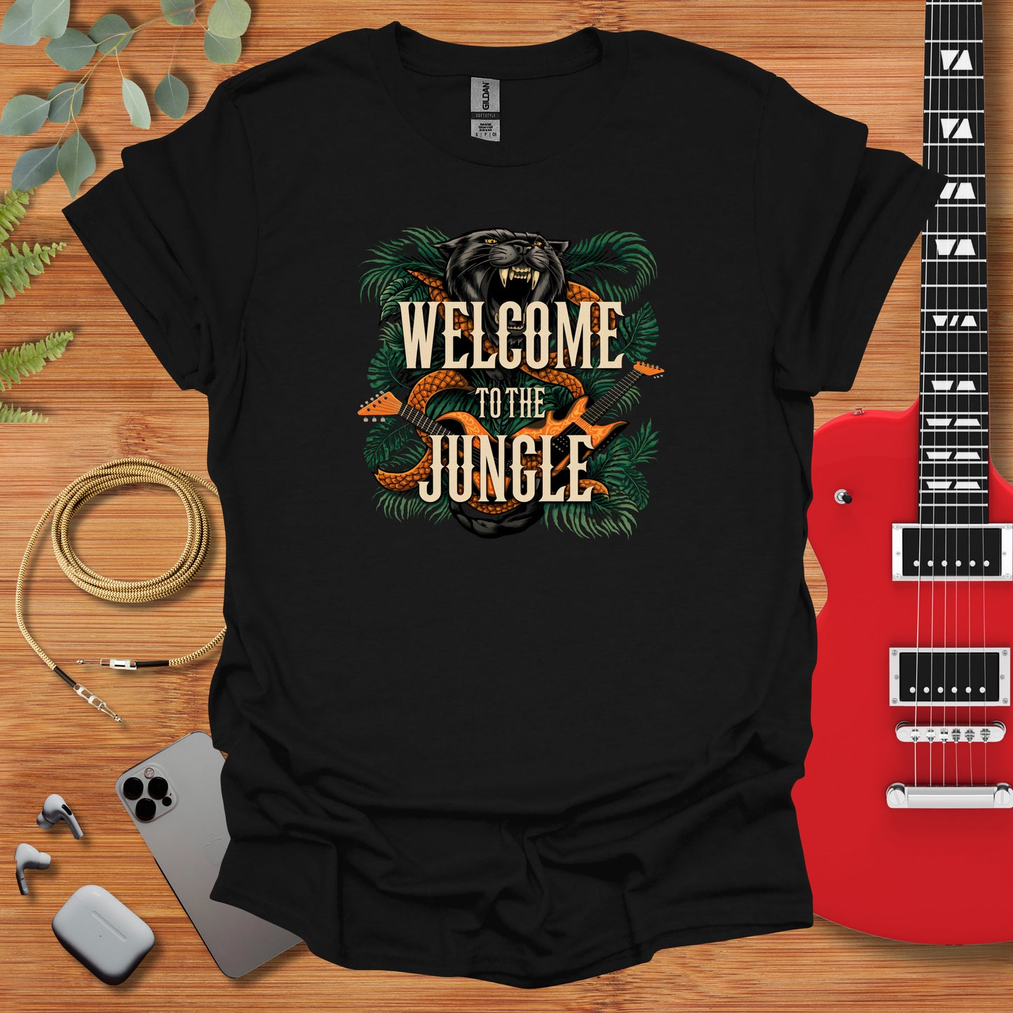 a black t - shirt with the words welcome to the jungle on it