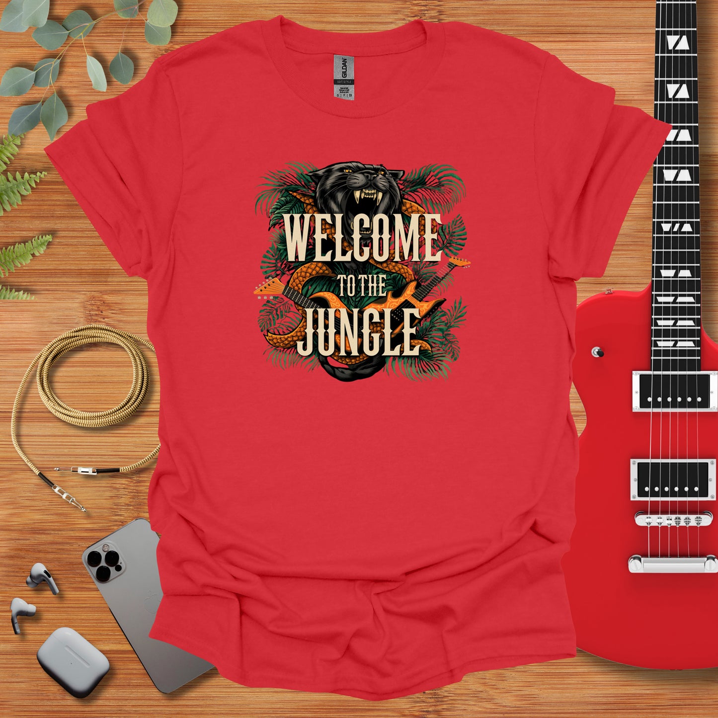 a red shirt with the words welcome to the jungle on it