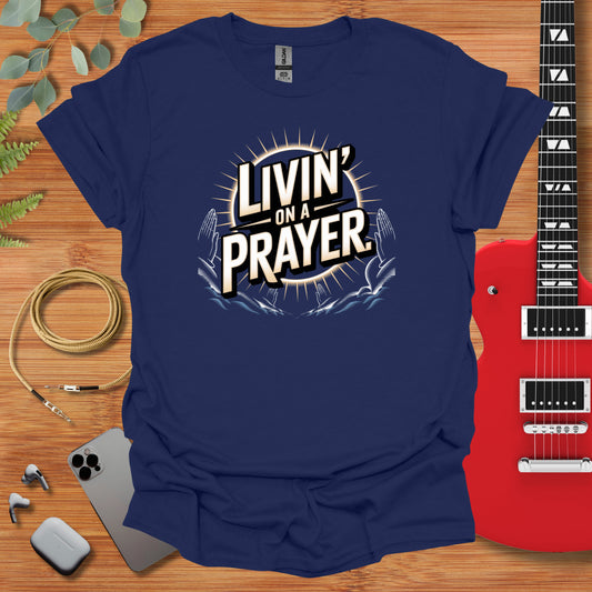 a t - shirt that says livn'on a prayer with a guitar and