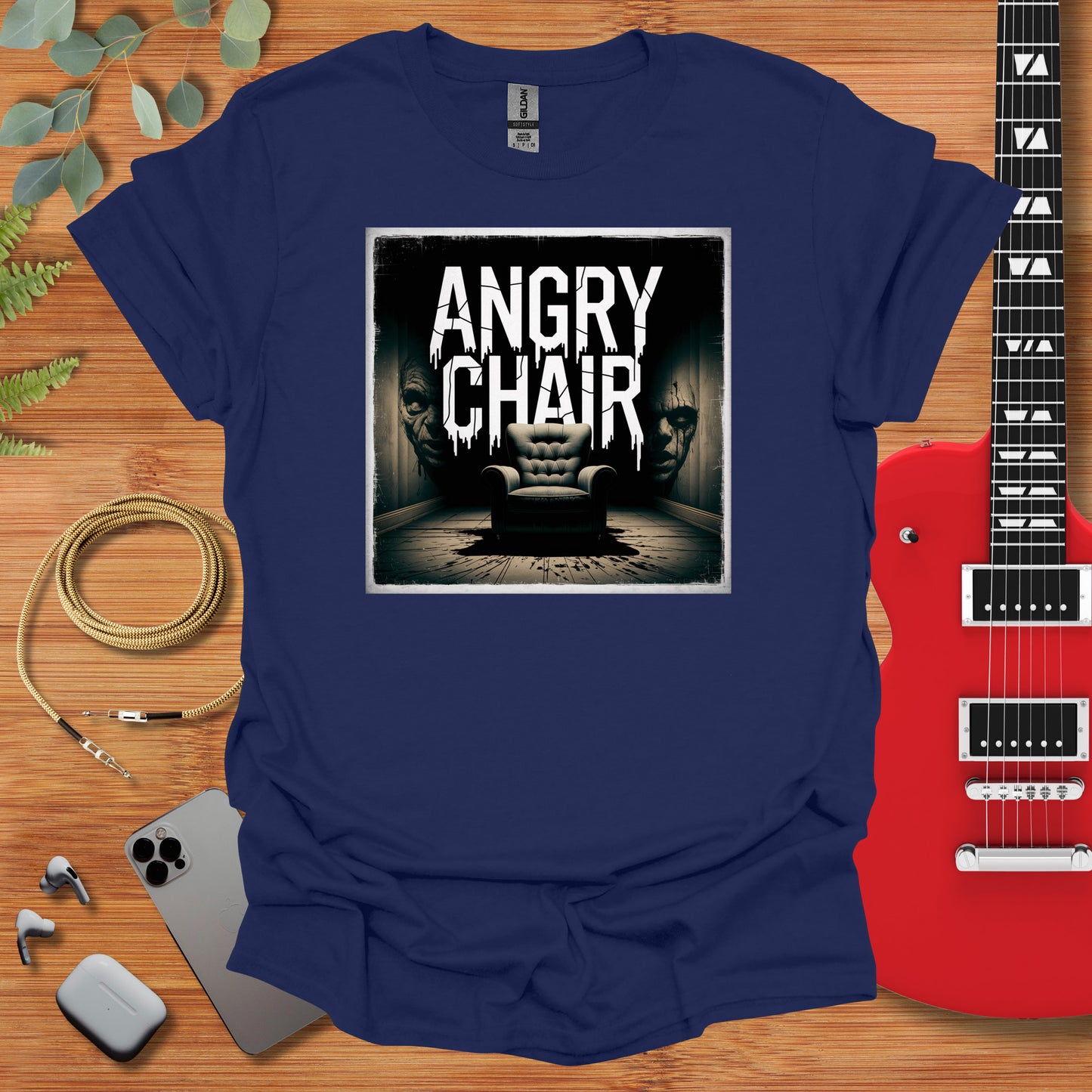 a t - shirt with an image of an angry chair on it