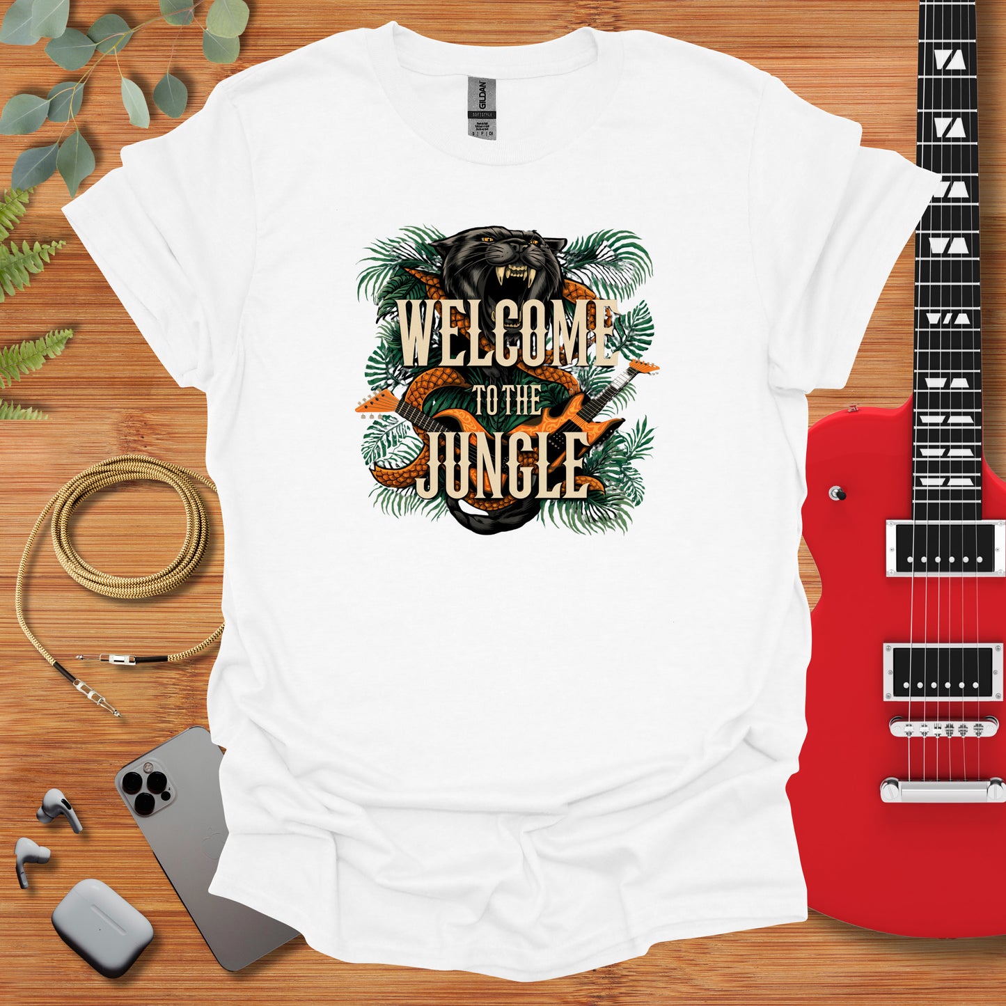 a white t - shirt with the words welcome to the jungle on it