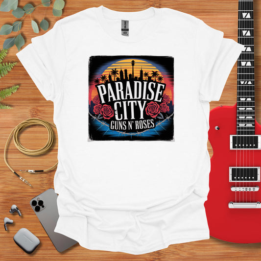 a white t - shirt with the words paradise city guns and roses on it