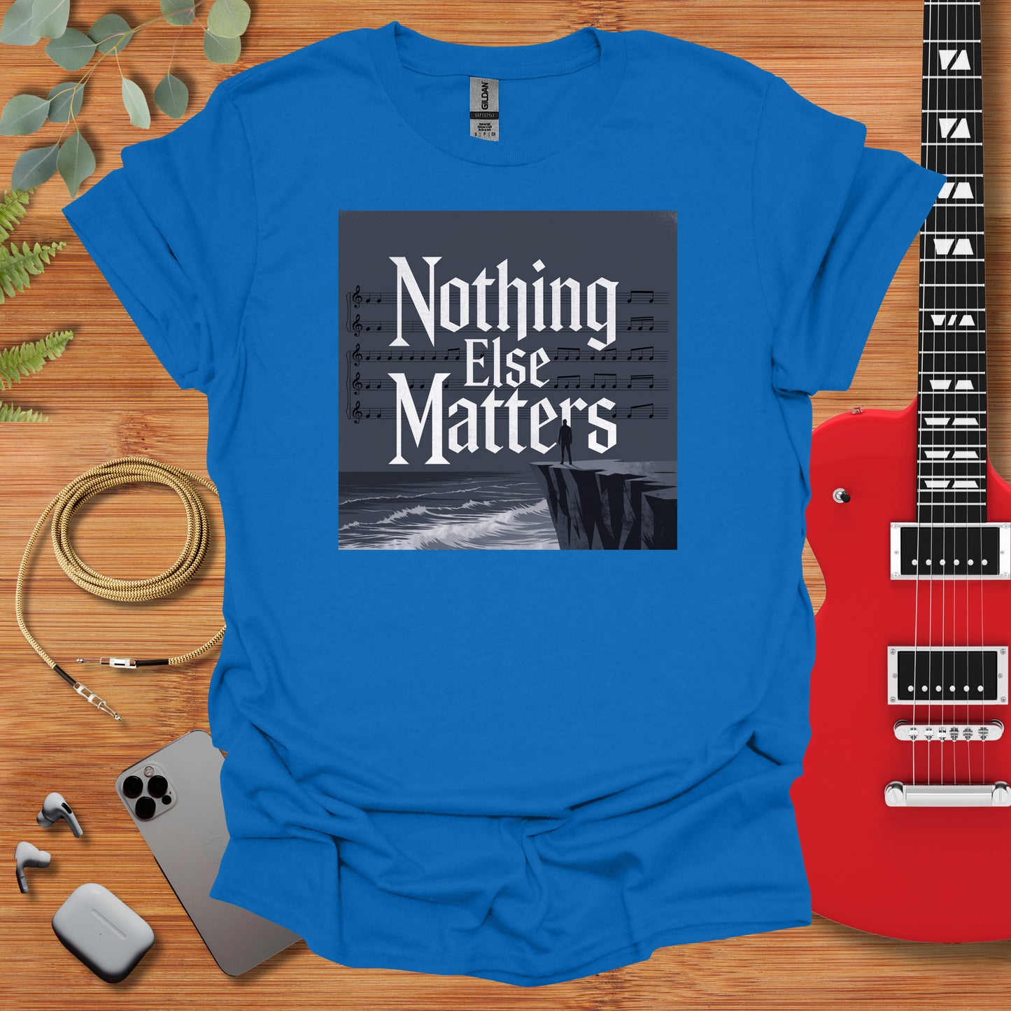 a blue t - shirt with the words nothing else matters on it