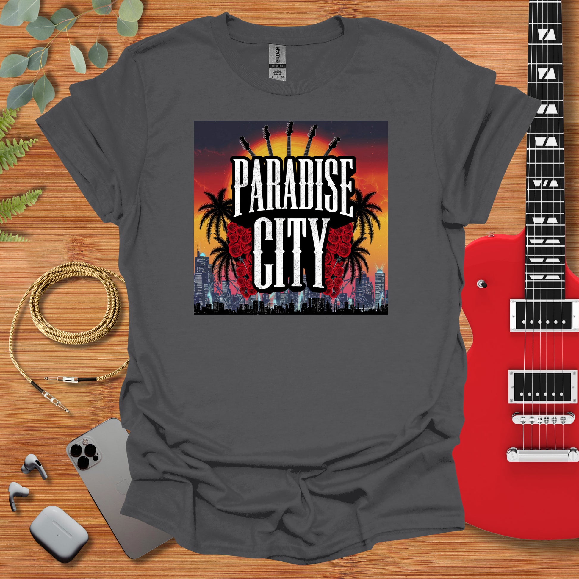 a t - shirt with the phrase paradise city on it