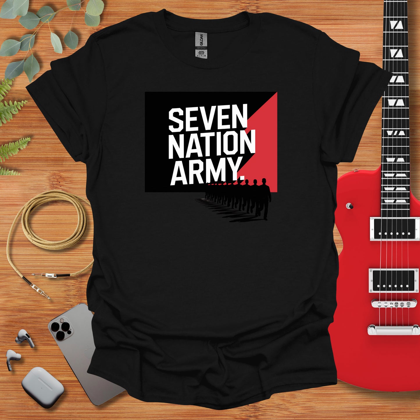 a black shirt with the words seven nation army on it