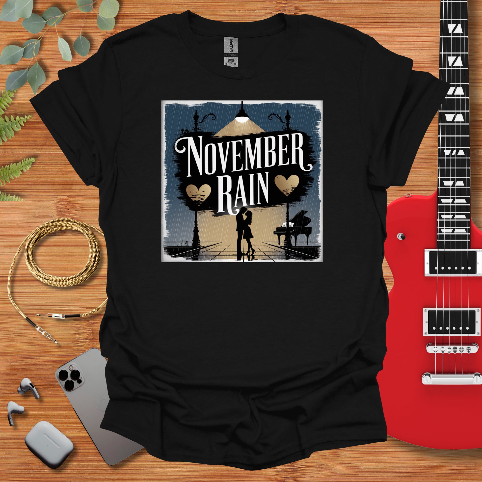 a black t - shirt with the words november rain on it