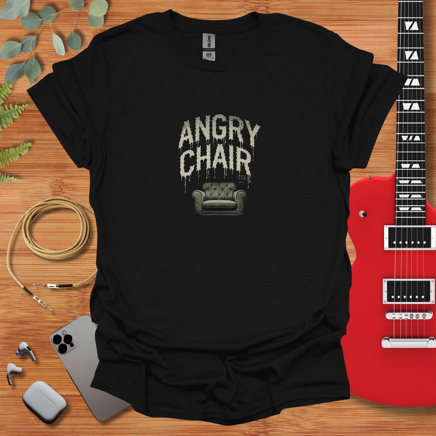 a black shirt with an angry chair on it