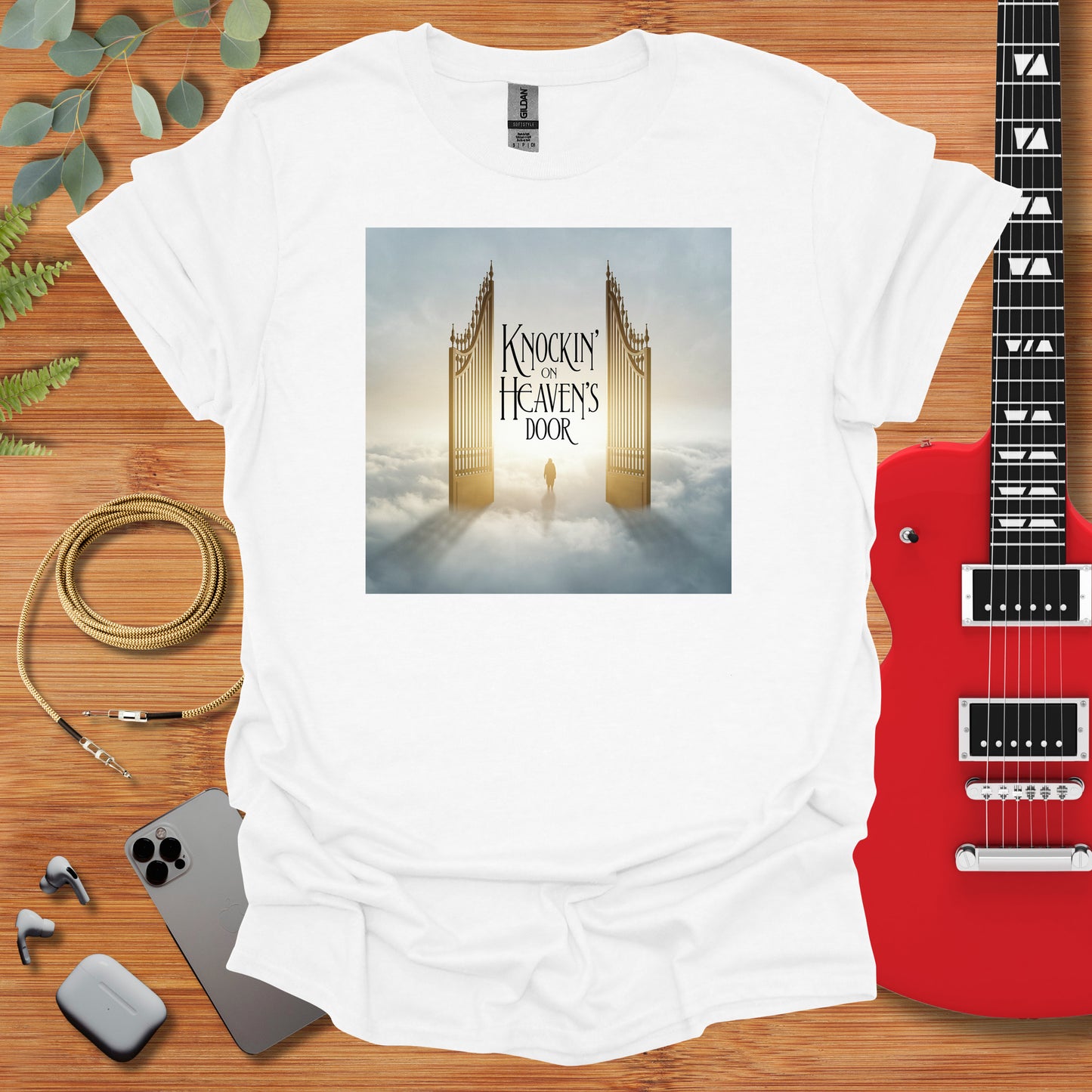 a white t - shirt with a picture of a golden gate on it