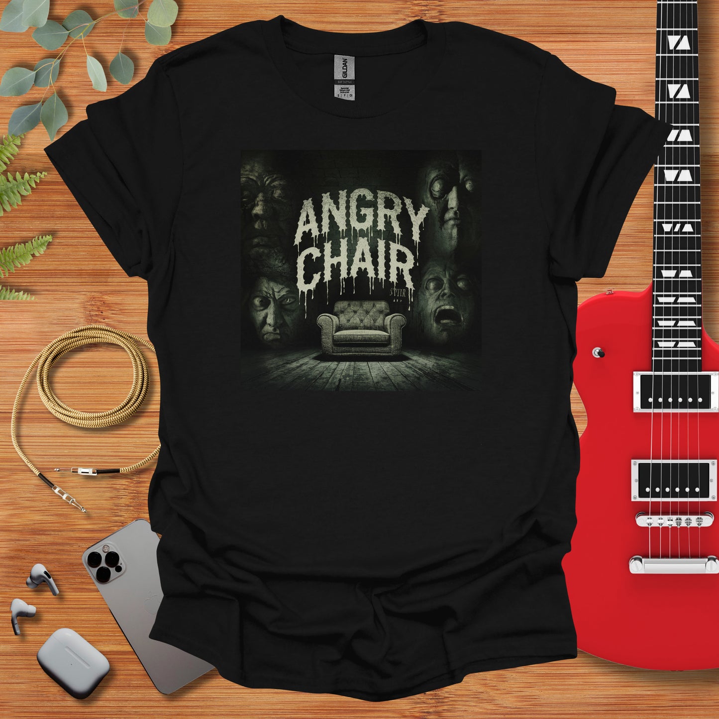 a black t - shirt with the words angry chair on it