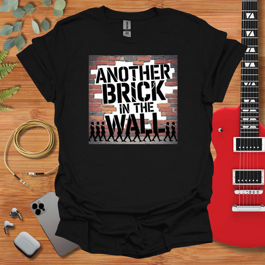 a t - shirt that says another brick in the wall