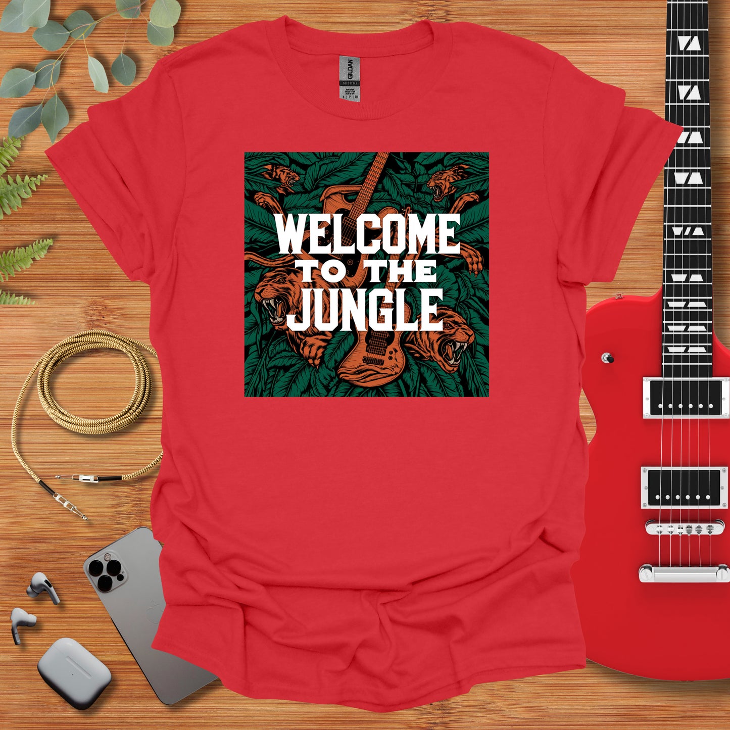 a red shirt with the words welcome to the jungle on it