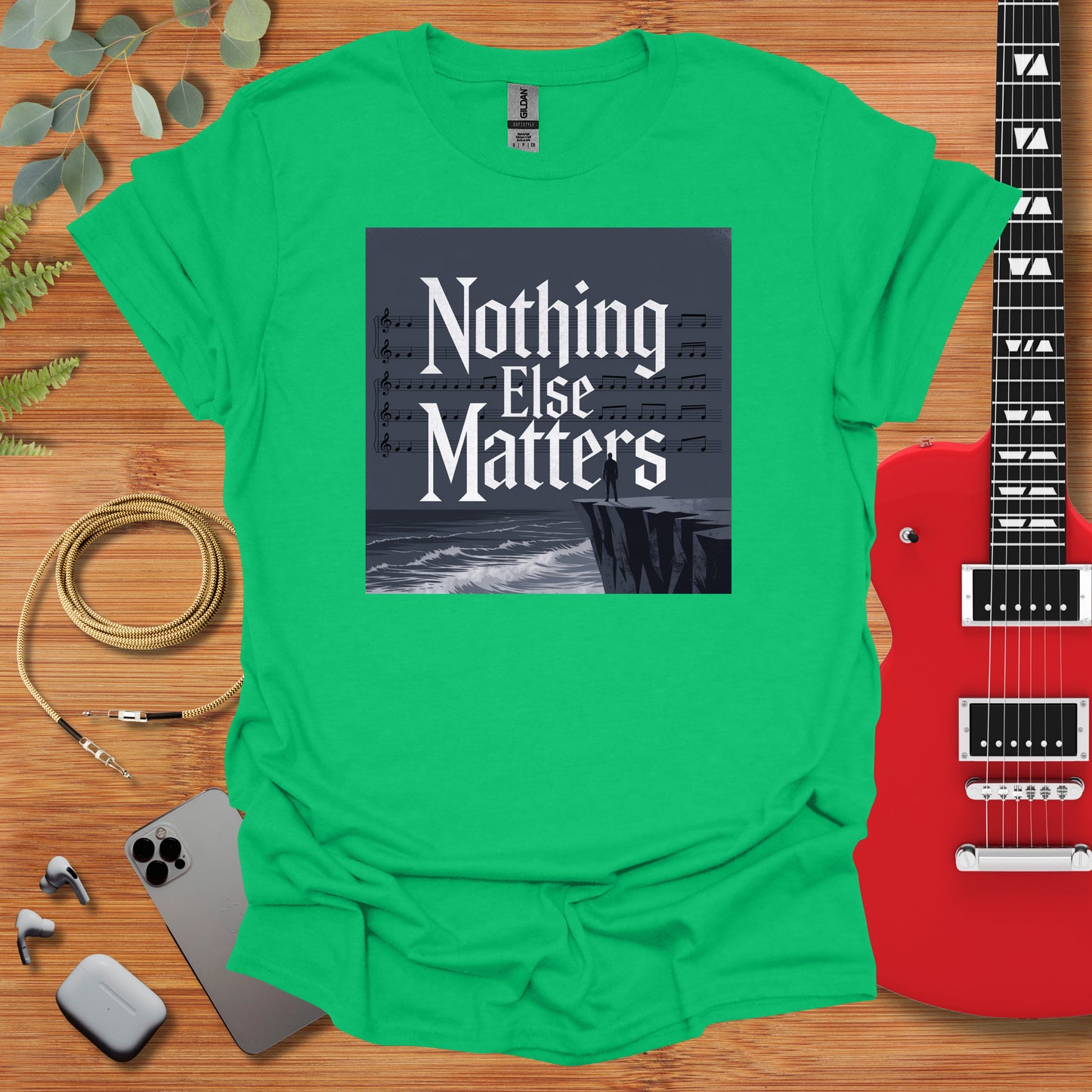 a green t - shirt with the words nothing else matters on it