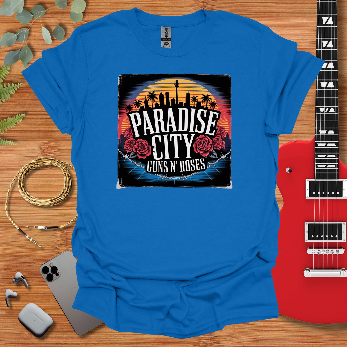 a t - shirt with a guitar and a guitar case