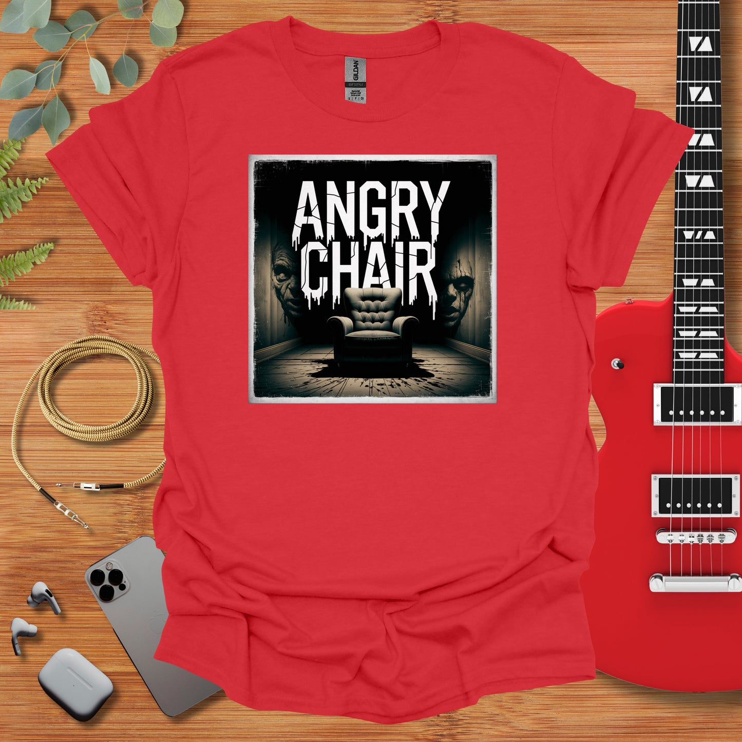 a red shirt with an image of an angry chair on it