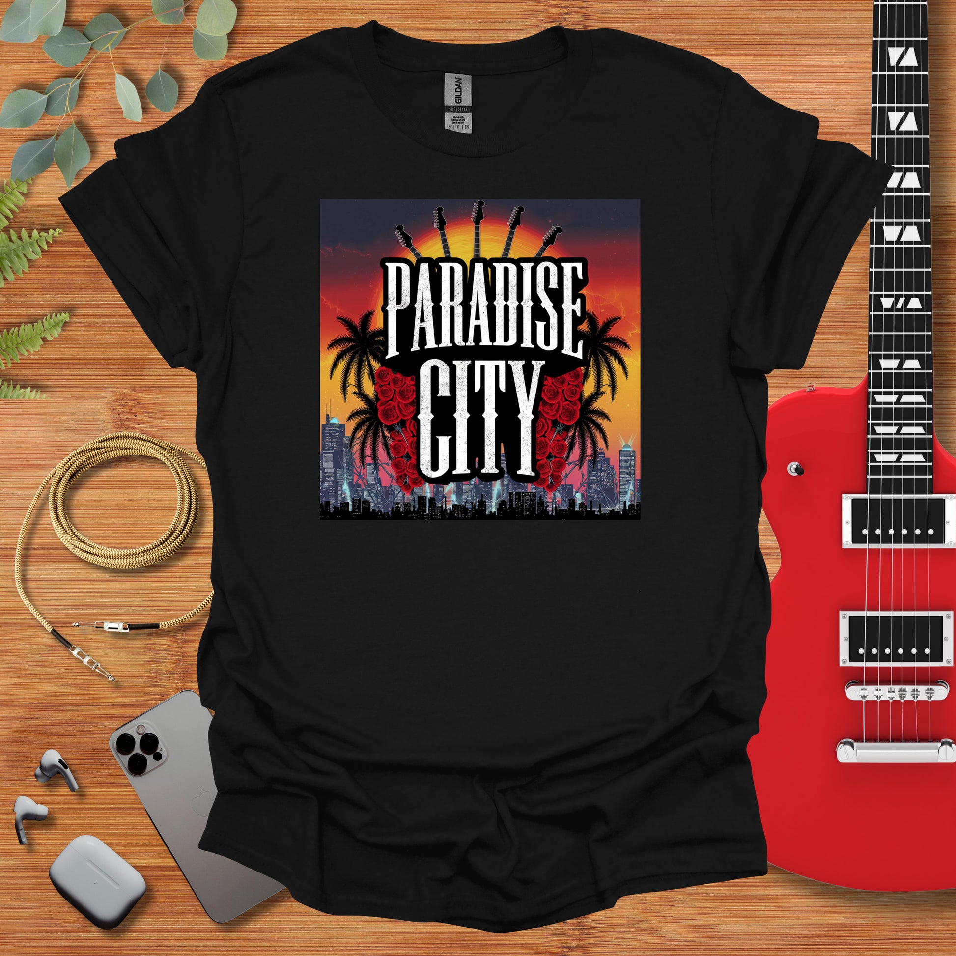 a t - shirt with the phrase paradise city on it