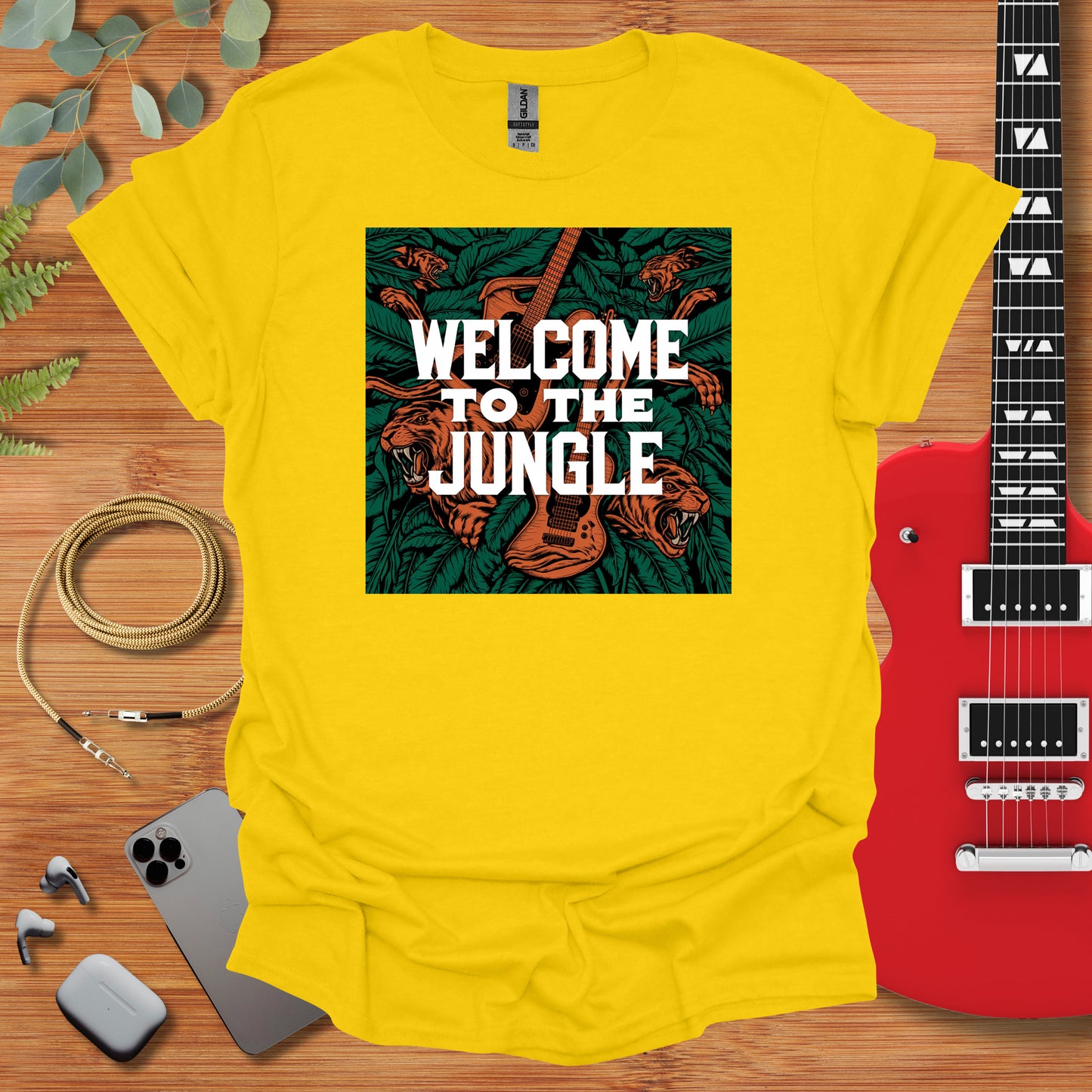 a yellow t - shirt with the words welcome to the jungle on it