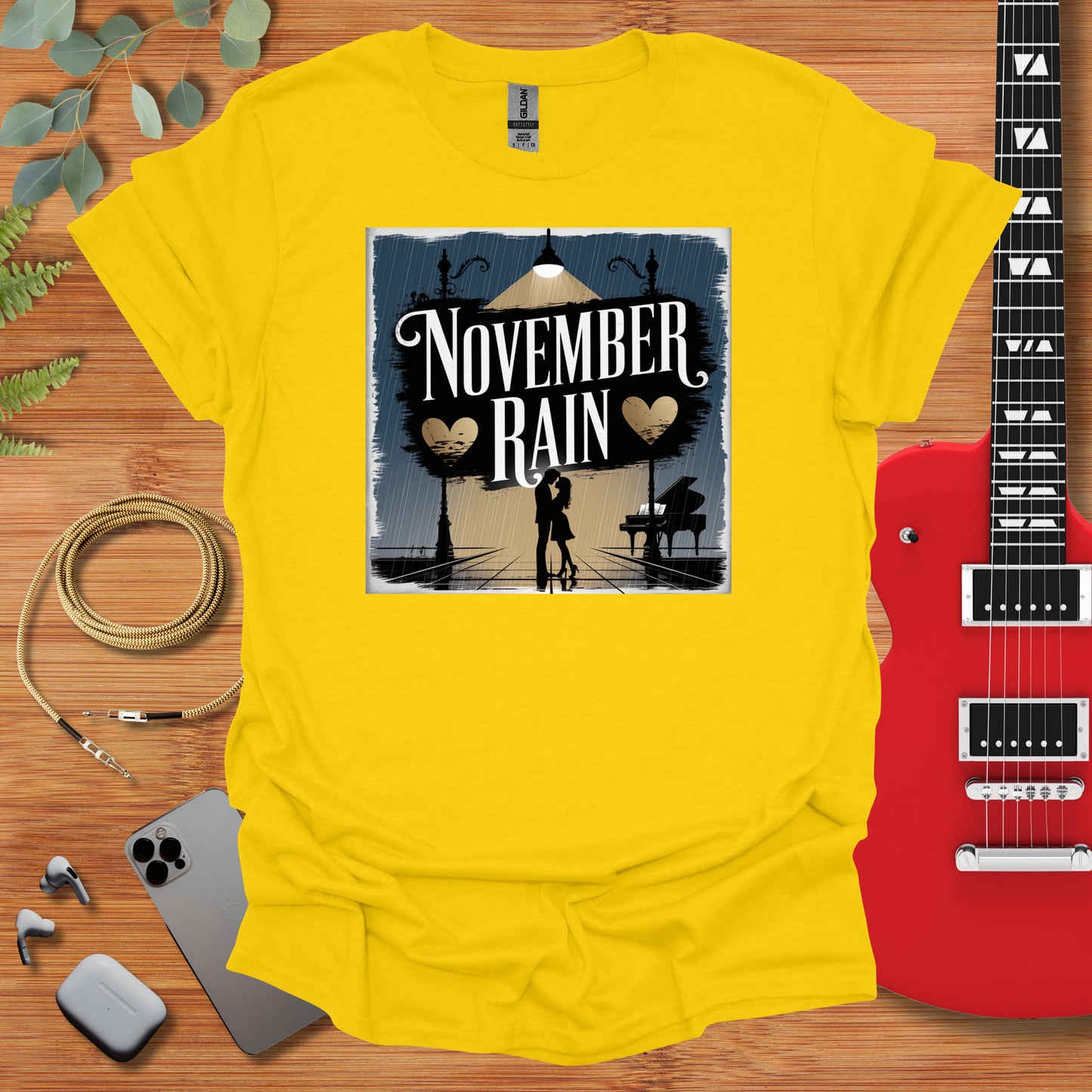 a yellow t - shirt with the words november rain on it